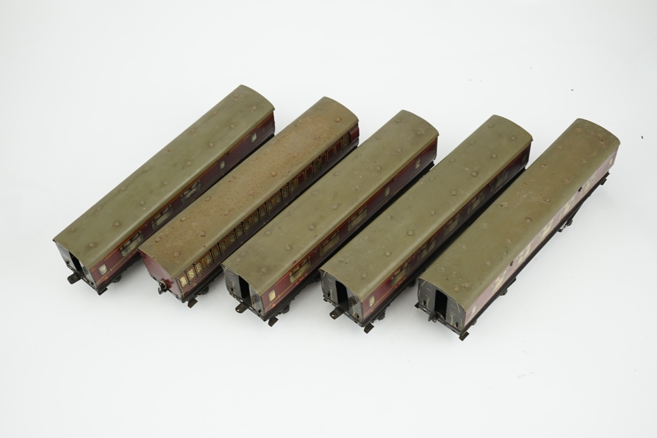 Five Hornby 0 gauge tinplate No.2 coaches in LMS livery